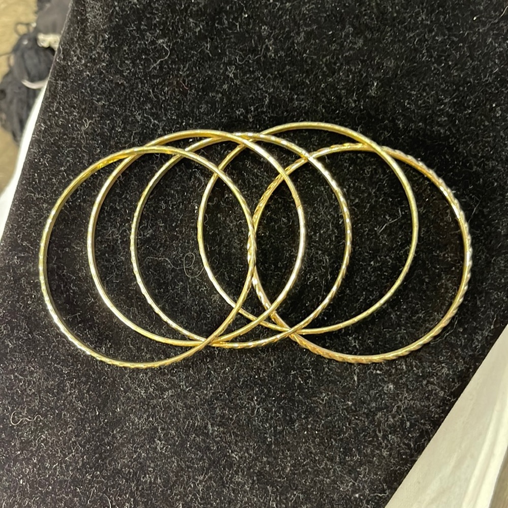 5 gold bracelets